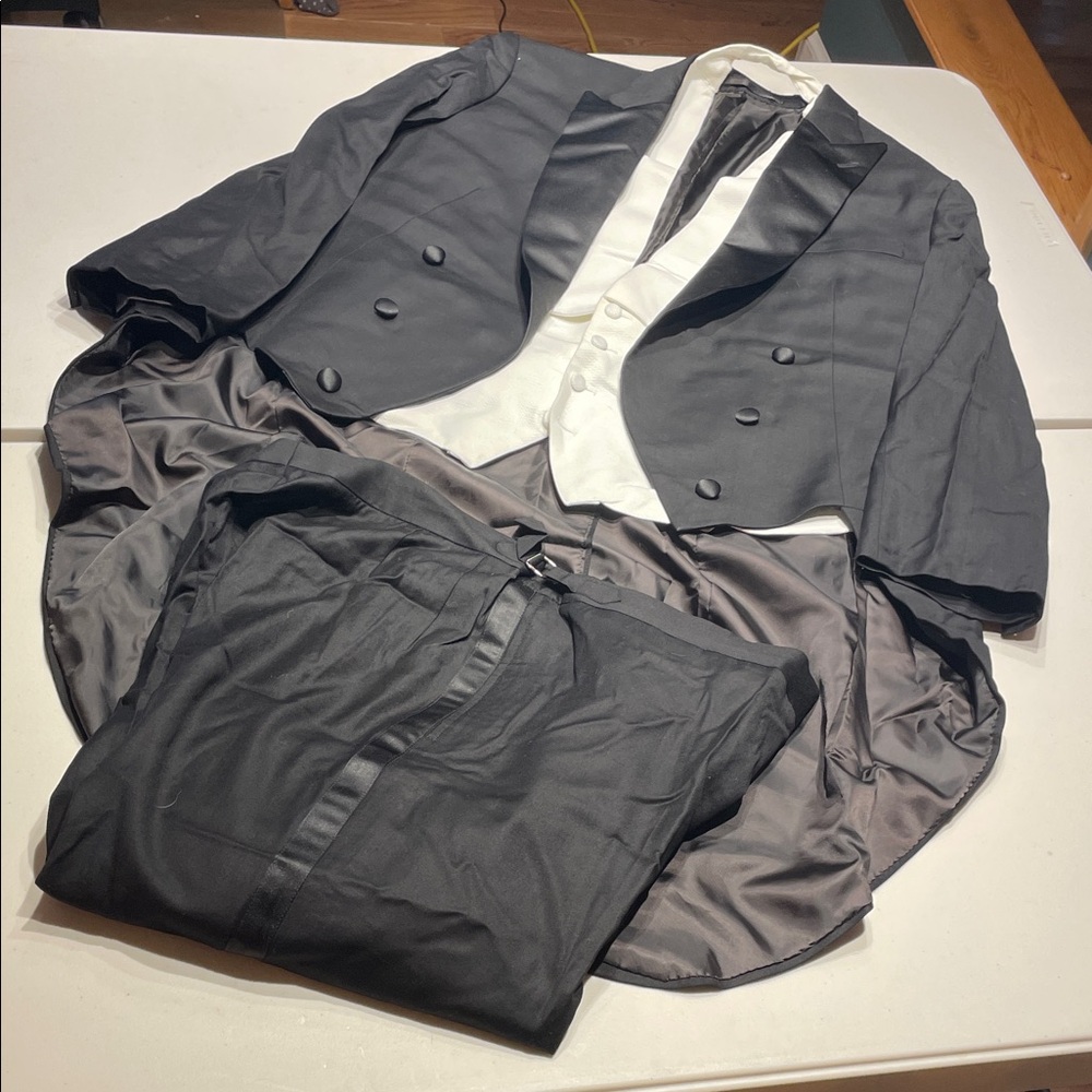Evening Suit (White Tie) size 48-50 Tailcoat and size 42 evening Trousers.